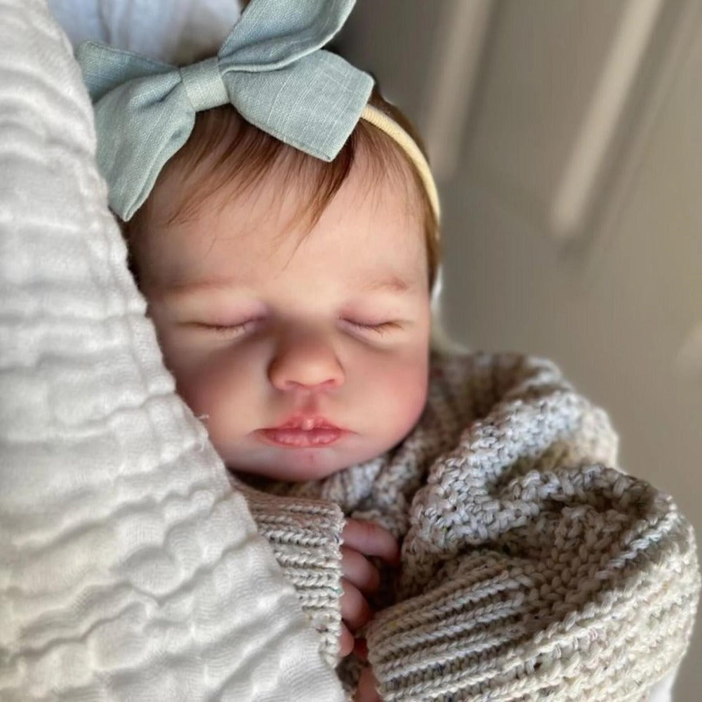 20-Inch Sleeping Reborn Baby Doll with Cloth Body and Hand-Rooted Hair