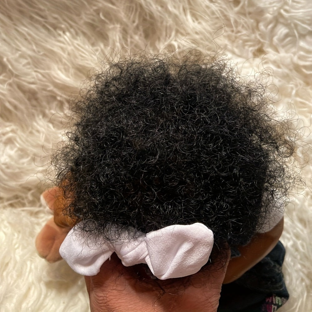 19-Inch Reborn Baby Doll with Curly Blue Hair and Sleeping Sounds