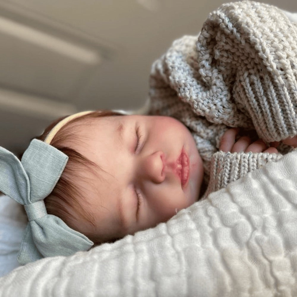 20-Inch Sleeping Reborn Baby Doll with Cloth Body and Hand-Rooted Hair
