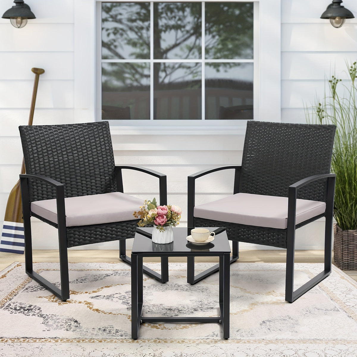 Patio Bistro Set shown in the Black Rattan Gray Mat option