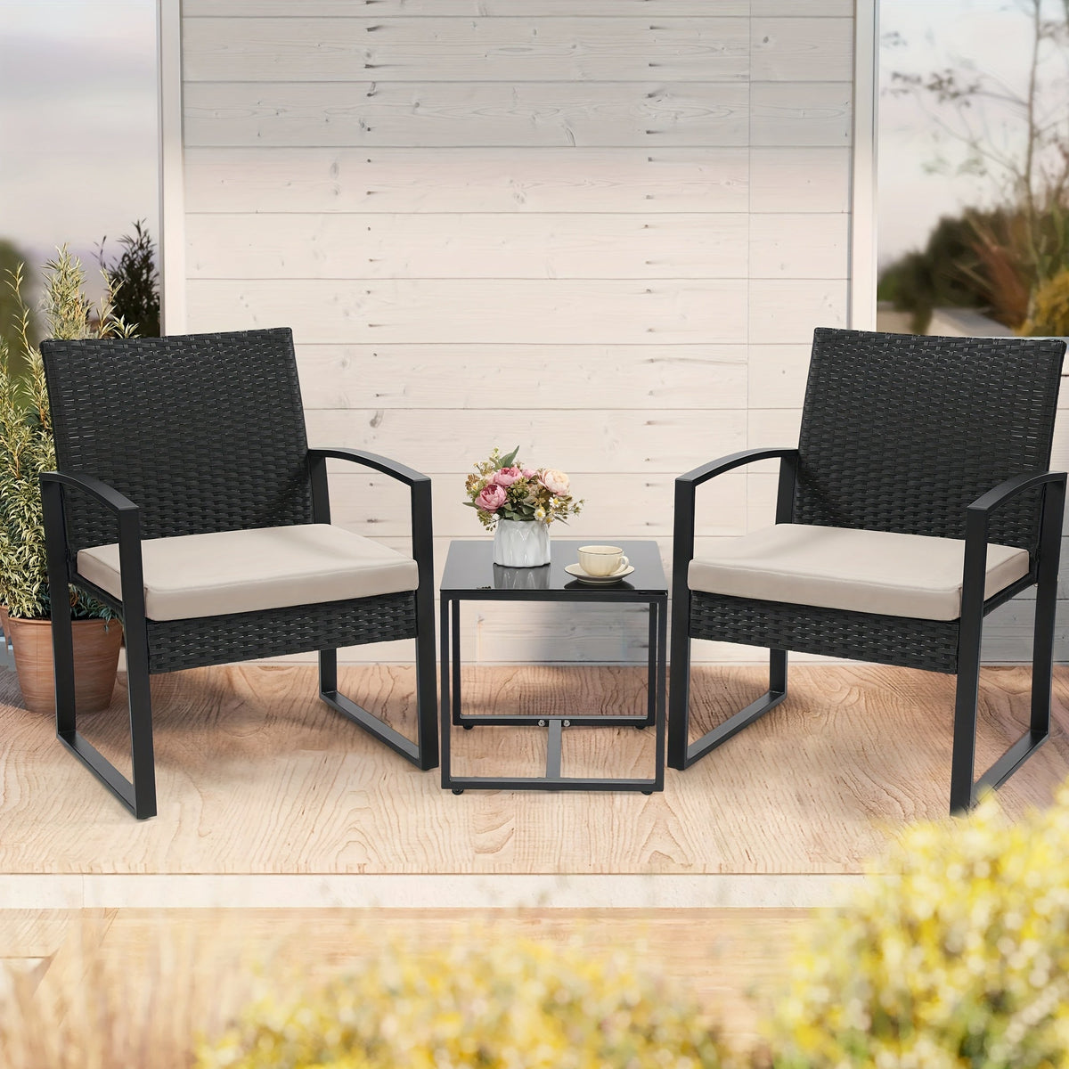 Patio Bistro Set shown in the Black Rattan Rice Mat option