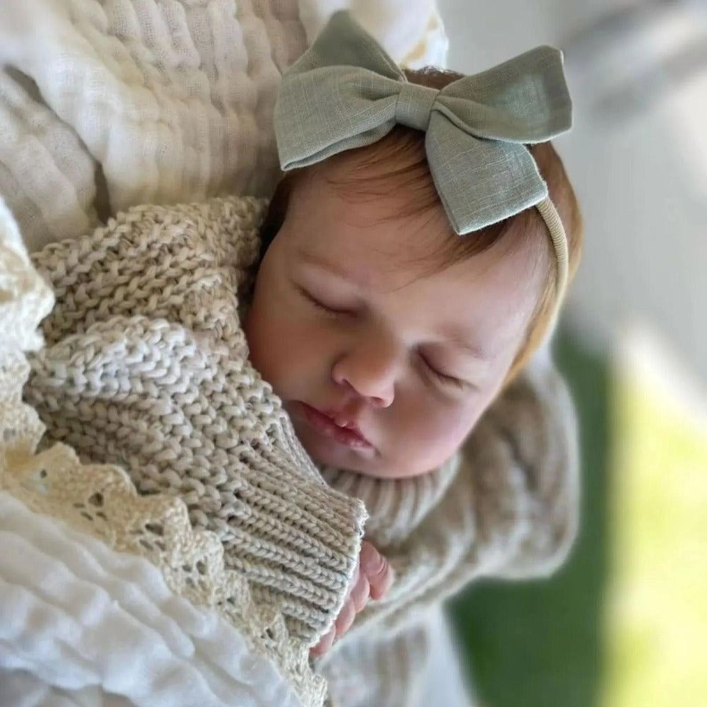 20-Inch Sleeping Reborn Baby Doll with Cloth Body and Hand-Rooted Hair
