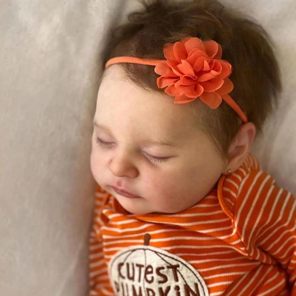 20-Inch Sleeping Reborn Baby Doll with Hand-Rooted Hair and Cloth Body
